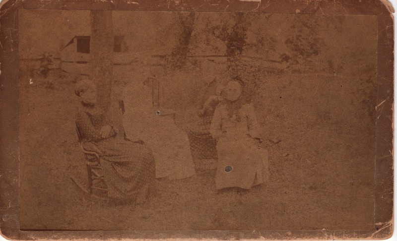 19th century photograph on tintype 8.5 x 5 3 women seated on chairs.jpg