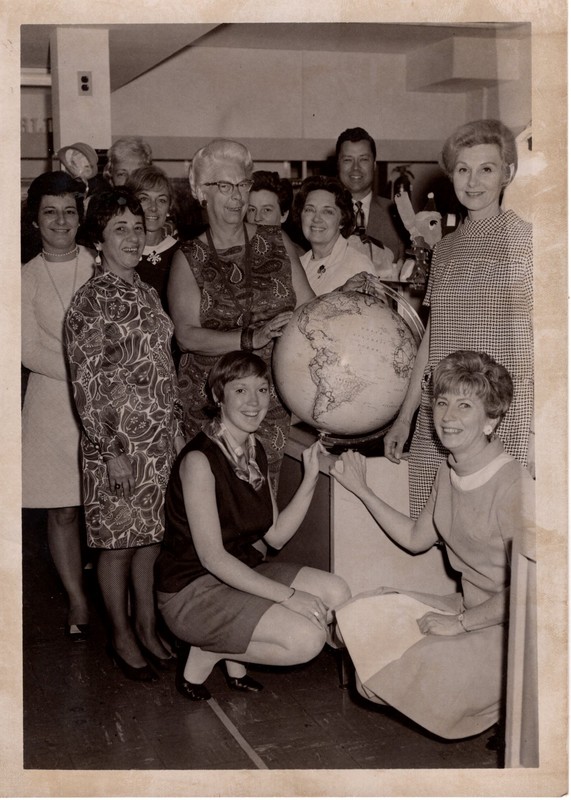 1 black and white photograph gifting a globe for the children's room August 1968.jpg