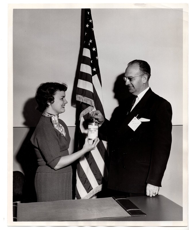 1 black and white photograph 8x10 Mayor Meyer inaugurates Tag Day with Mrs. Robert Cousar Public Welfare Chairman of the Bergenfield Junior Woman's Club Nov. 17 1955.jpg