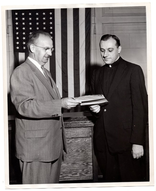 1 black and white photograph 8x10 of Mayor Edward Meyer and unidentified priest undated.jpg