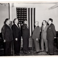 1 black and white photograph 8x10 mayor and council swearing in pictured six public officials undated.jpg