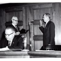 1 black and white photograph 8x10 Mayor and Council Swearing In pictured Bernard Aschenbrand Mayor Hugh Gillson and H. Radford Beucler January 1962.jpg