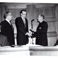 1 black and white photograph (8x10) Mayor Hugh Gillson and member of the fire department at Borough Hall, Jan. 1, 1962.jpg