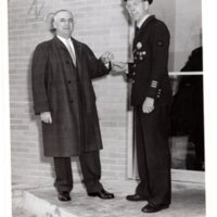 1 black and white photograph (8x10) George Rosein and contractor (Sirubi) in front of Alert Fire House, West Church Street, 1962.jpg