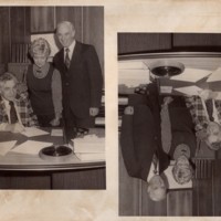 1 black and white photograph 3 individuals at a table signing a paper undated.jpg