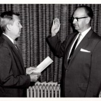 1 black and white photograph 8x10 Mayor Edward Meyer swearing in by Borough CLerk H. Radford Beucler Undated.jpg