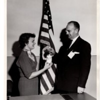 1 black and white photograph 8x10 Mayor Meyer inaugurates Tag Day with Mrs. Robert Cousar Public Welfare Chairman of the Bergenfield Junior Woman's Club Nov. 17 1955.jpg