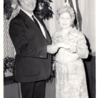 1 black and white photograph 2 unnamed people standing together undated