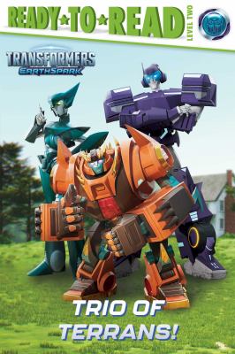 Cover for a beginning readers book. Three Transformers sit in a lawn, looking towards the reader. Text reads, "Ready to Read Level Two. Transformers Earth Spark. Trio of Terrans!"