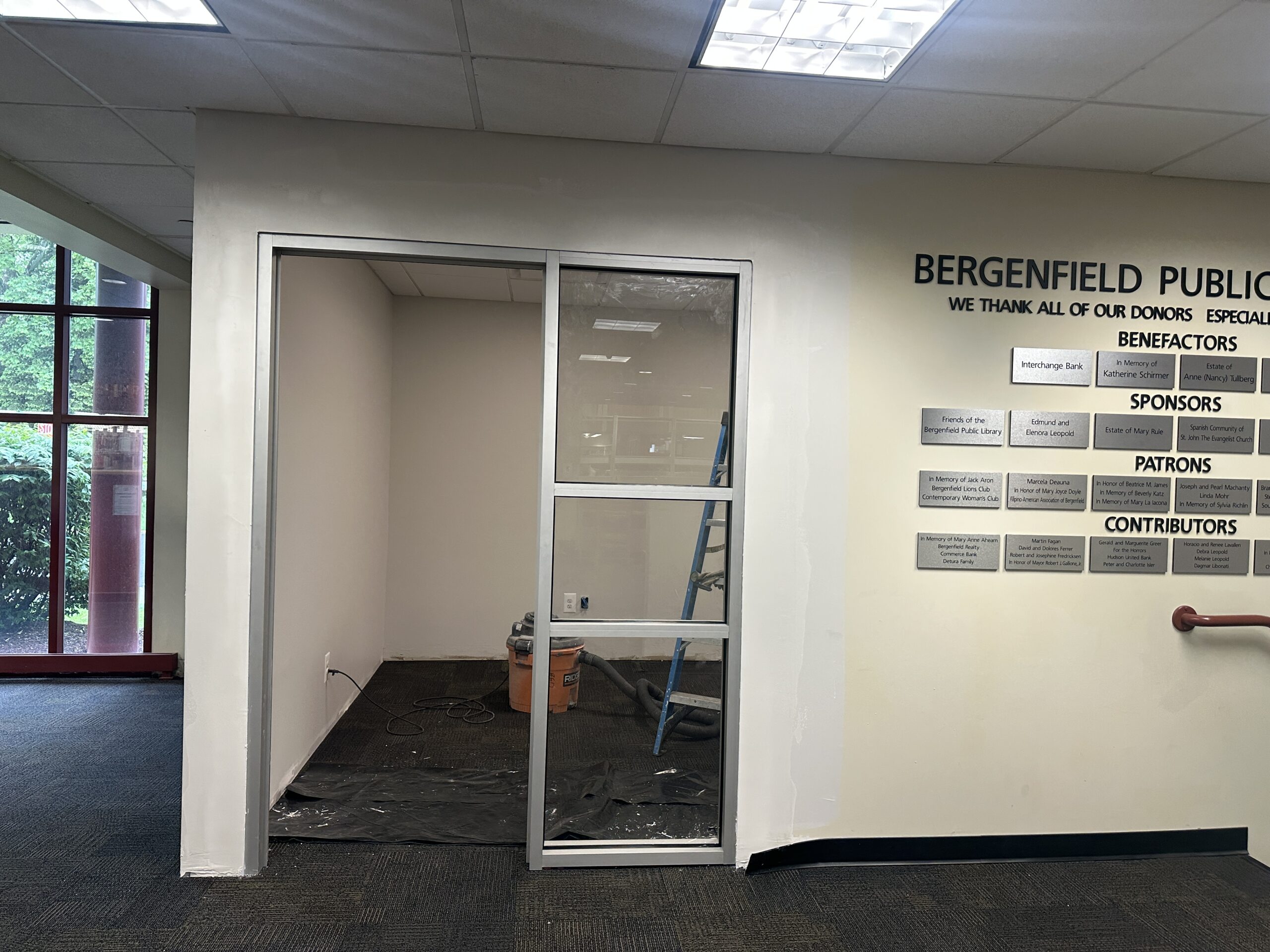 IMG_1073 Photo showing week 14 of the teen room construction. Image is of the new reference office doorway.